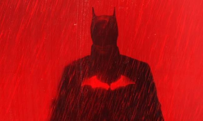 Robert Pattinson as the Dark Knight in red promo art for The Batman.